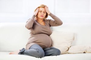 Pregnant woman with a headache.